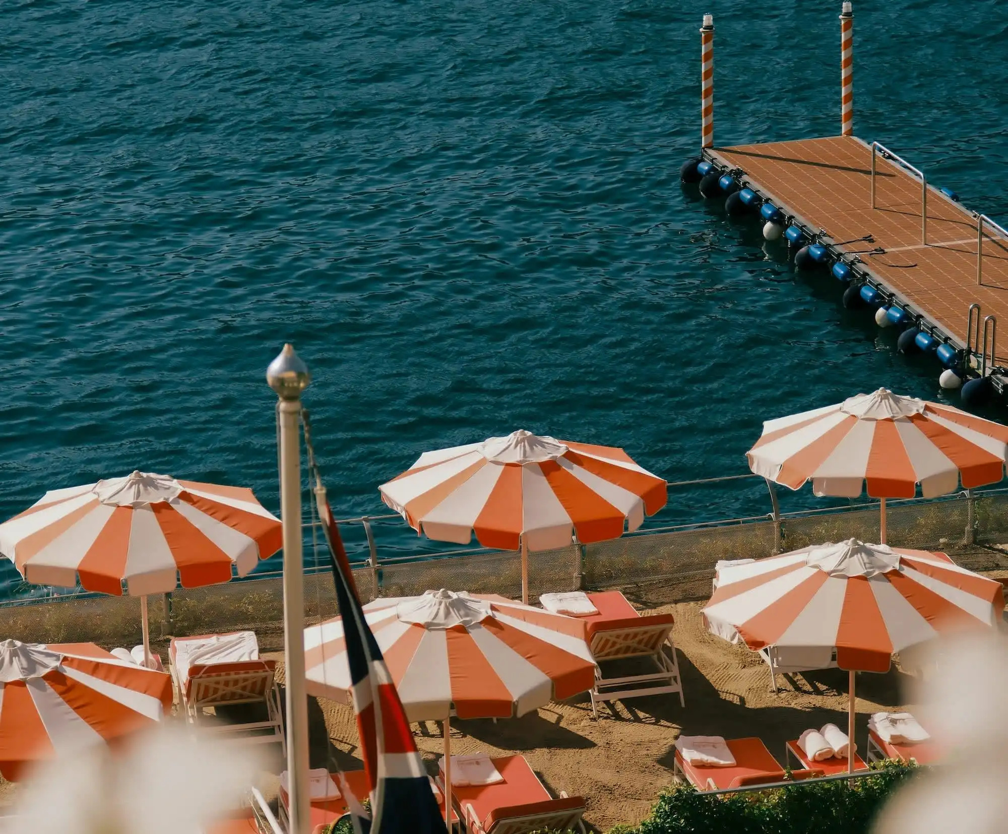 Stunning lakeside view of Lake Como with elegant villa architecture and serene waters